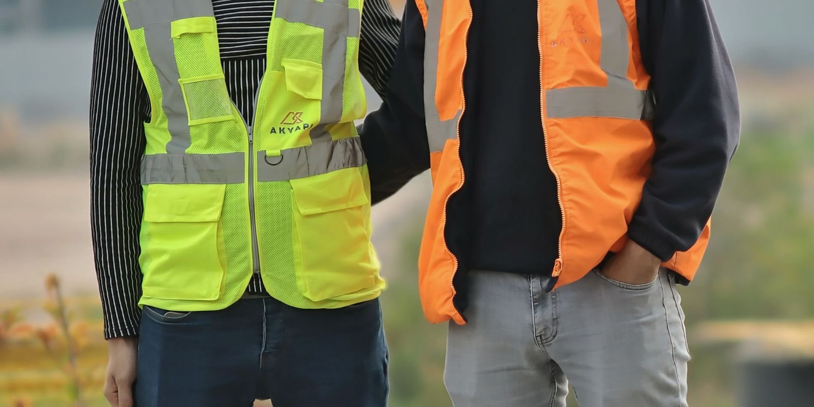 Tradies in safety gear on a worksite